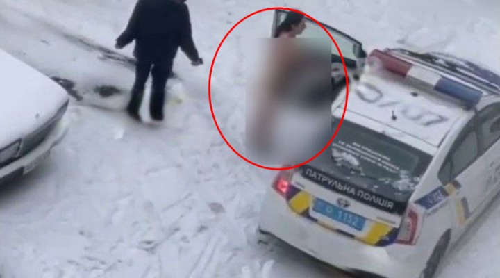 Кричала, що кохає: у Києві гола дівчина бігала по снігу за чоловіком (відео)